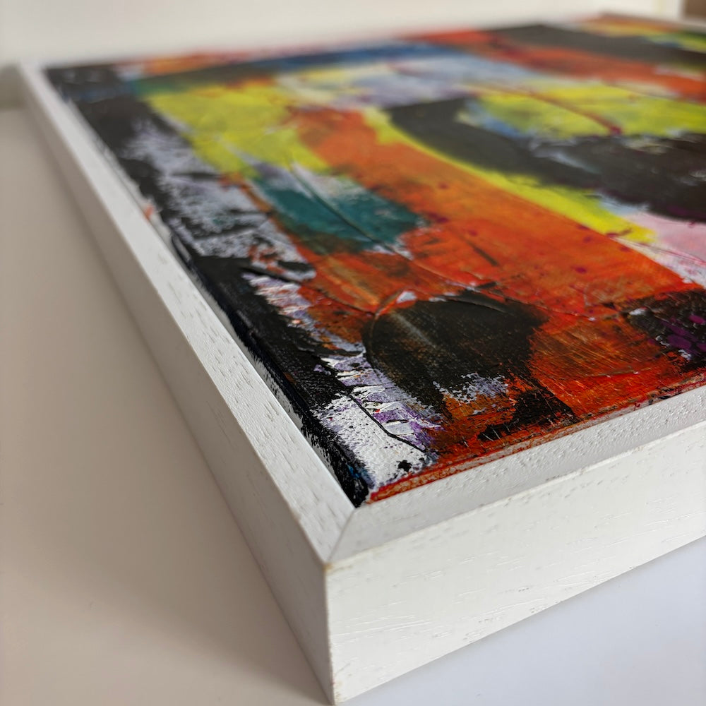 multi-colour abstract original canvas painting in a white float frame showing closeup corner details