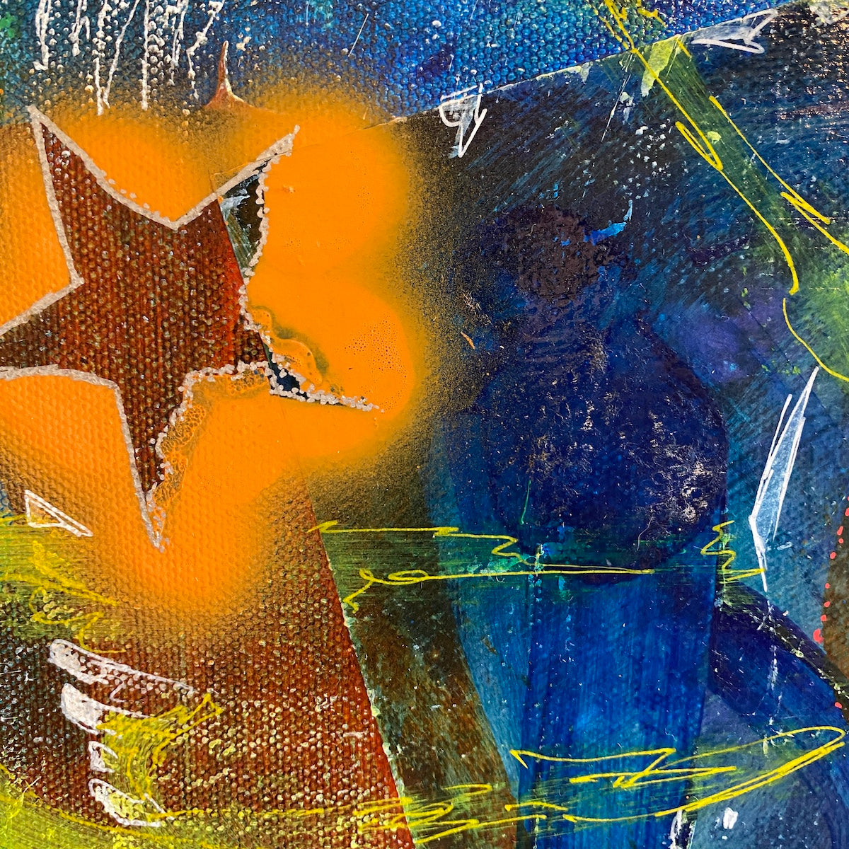 Closeup of abstract artwork with orange, blue, and yellow colours, and stars