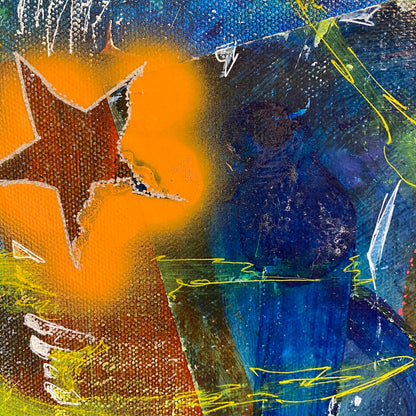 Closeup of abstract artwork with orange, blue, and yellow colours, and stars