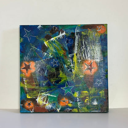 a multi-coloured original canvas painting white backdrop