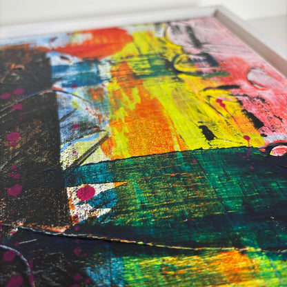 multi-colour abstract original canvas painting in a white float frame showing back edge detail
