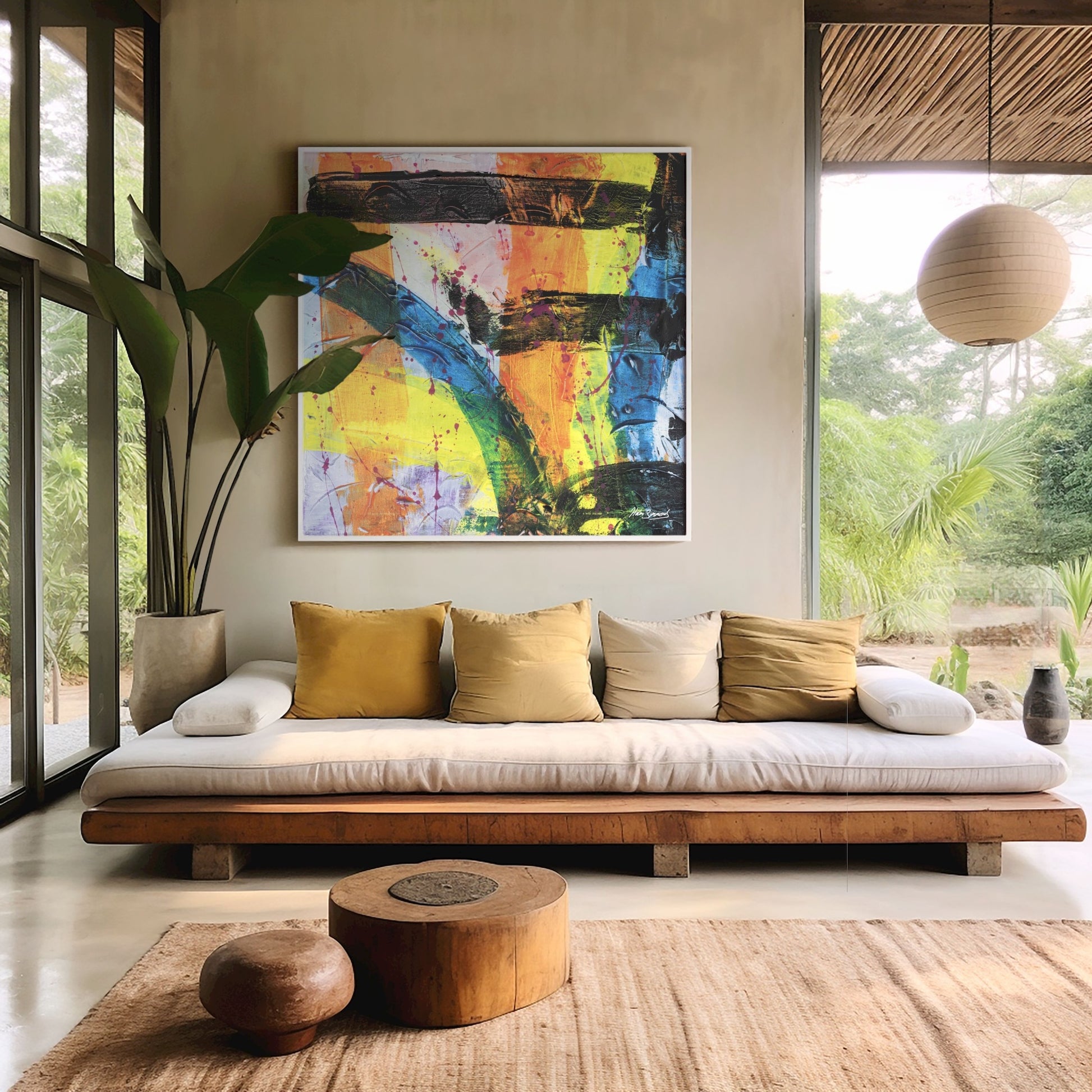 multi-coloured white framed abstract canvas wall art print in a neutral living room