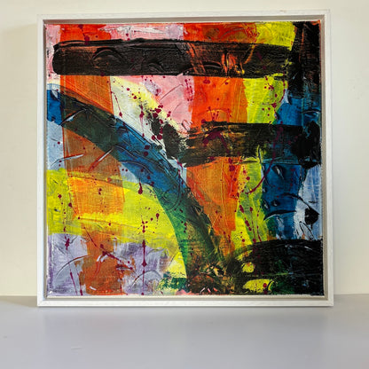 multi-colour abstract original canvas painting in a white float frame with a white backdrop