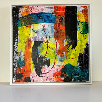 multi-colour abstract original canvas painting in a white float frame with a white backdrop 