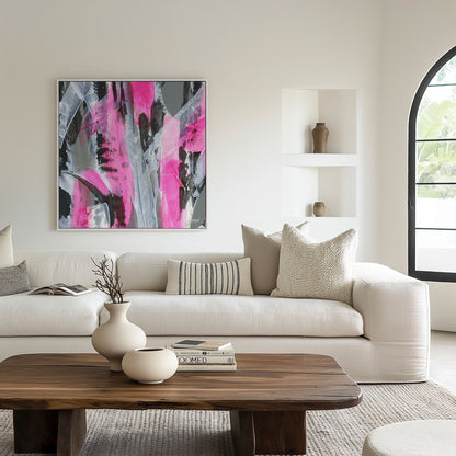 Square White framed pink abstract canvas wall art print in a light and airy living room