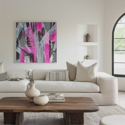 Square white framed pink abstract canvas wall art print in a light living room video mockup