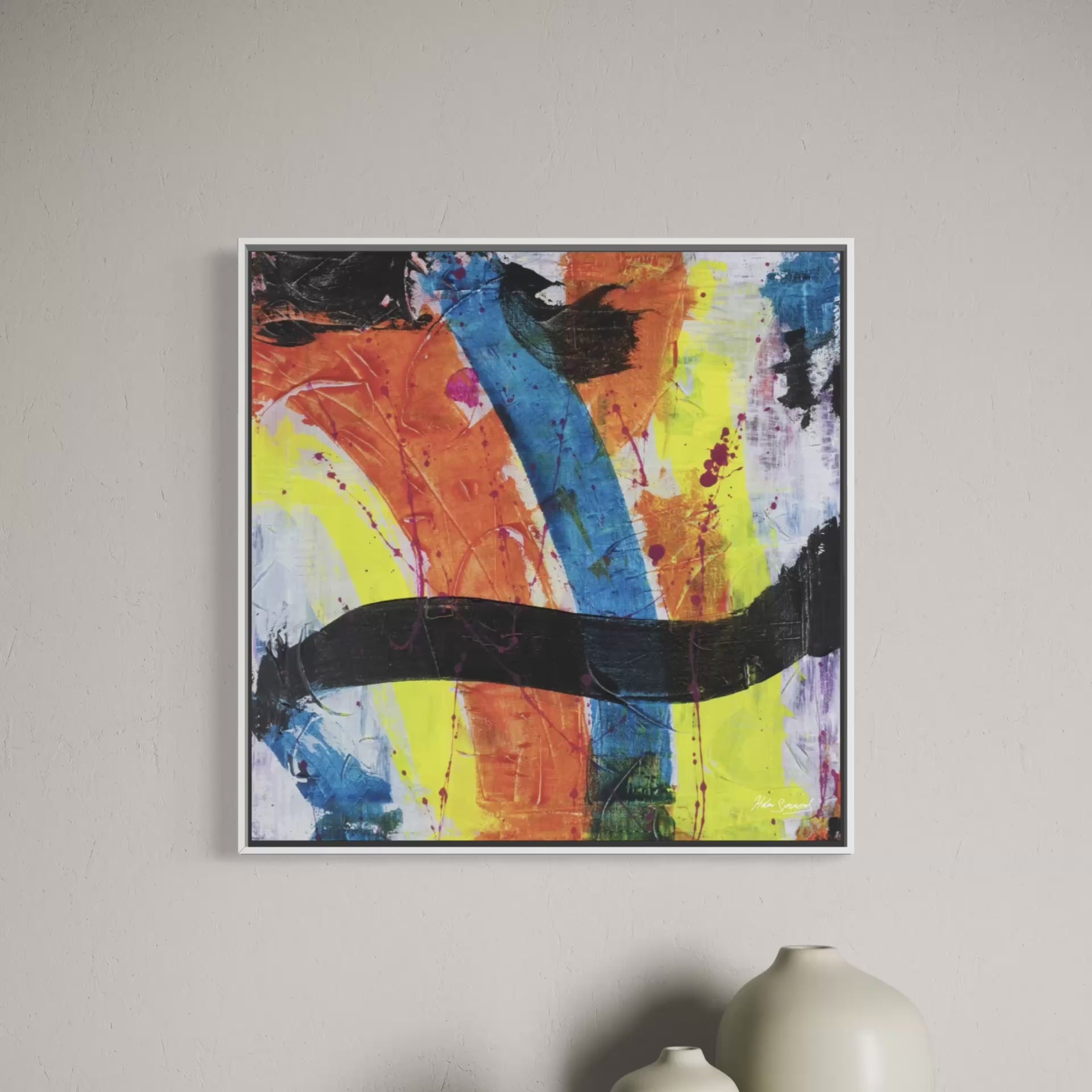 A short video showing an abstract canvas original in a white frame on a pale wall.